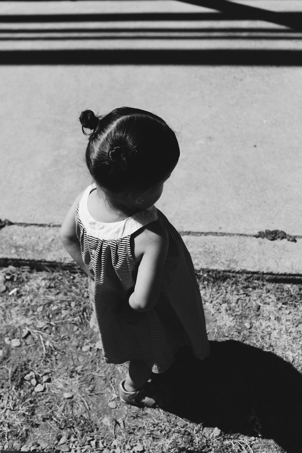 grayscale photo of a girl toddler