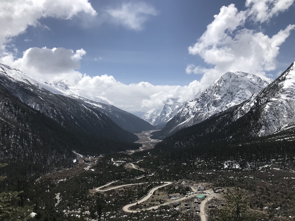 snow covered mountain during daytime