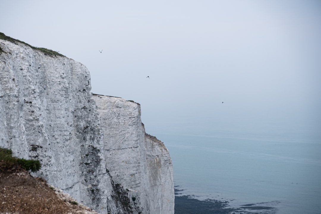 landscape photo of a gray cliff,