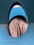 Futuristic towel displayed alongside a transparent digital screen showing fabric details.