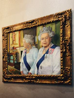 Softly lit portrait of the two sisters founders wearing signature pieces, smiling warmly.