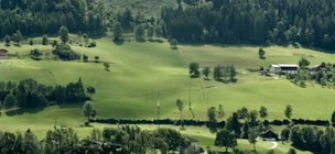 A picturesque view of a local organic farm surrounded by nature.