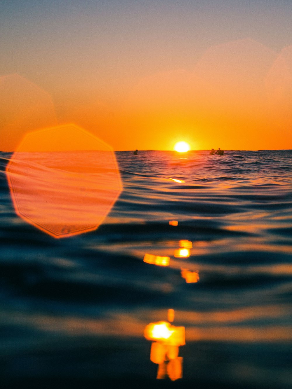 body of water during golden hour