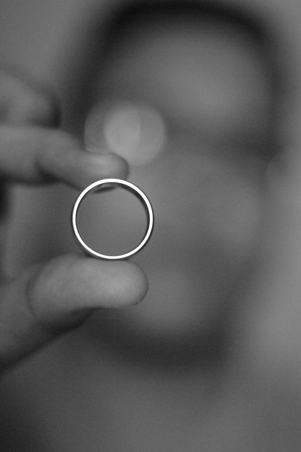 grayscale photography of ring