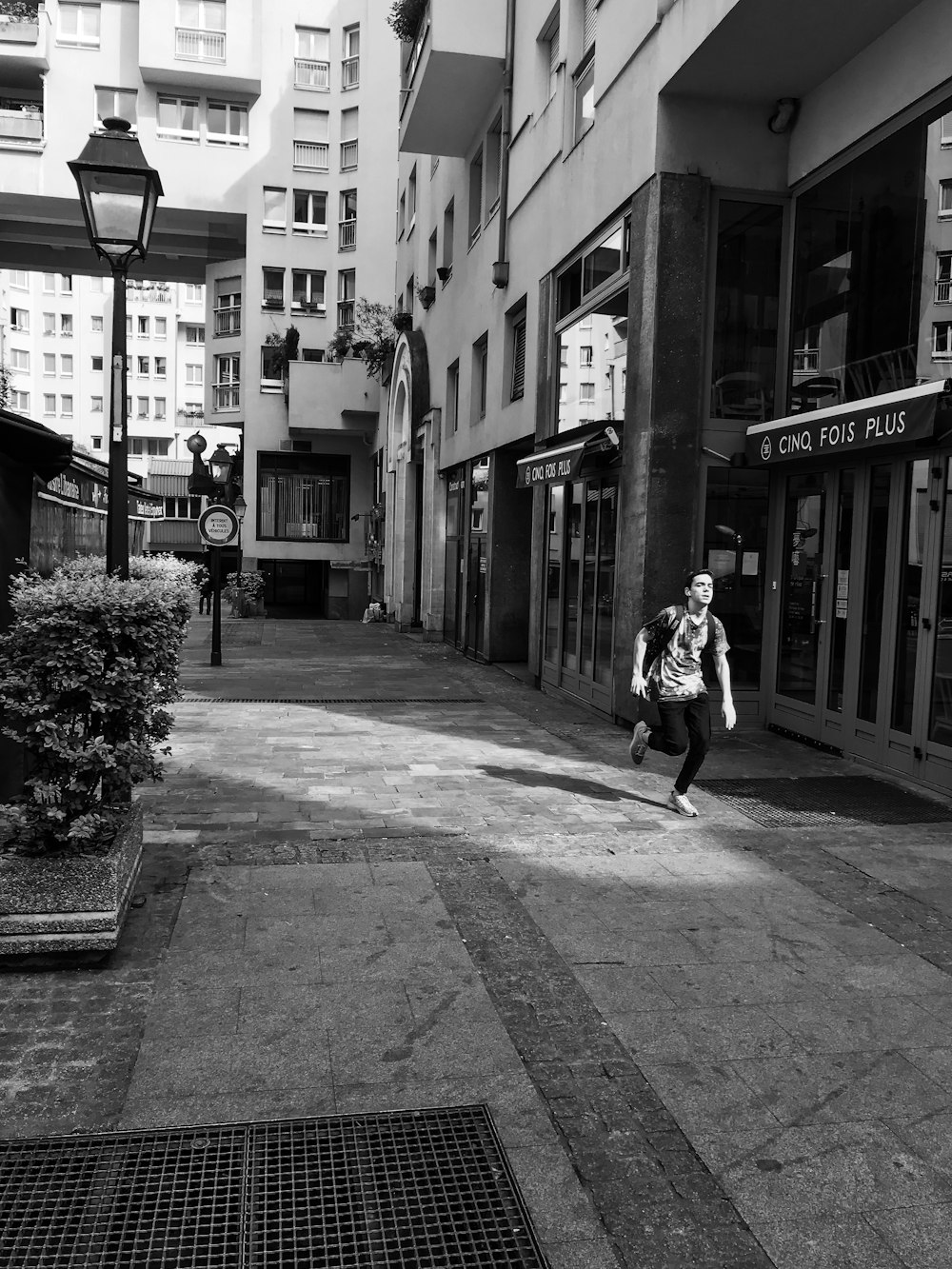 man running near building