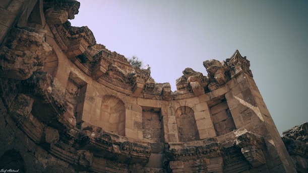 A detailed photograph of an ancient megalithic structure at sunrise, highlighting its weathered textures and mysterious aura.