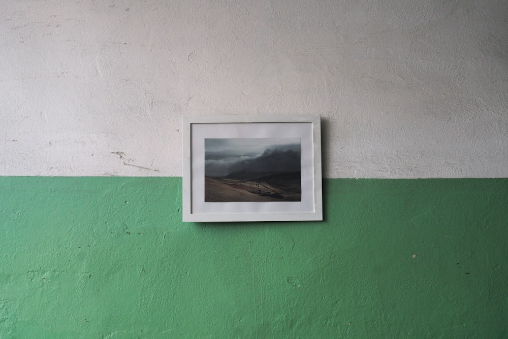 white wooden framed landscape photo wall decor
