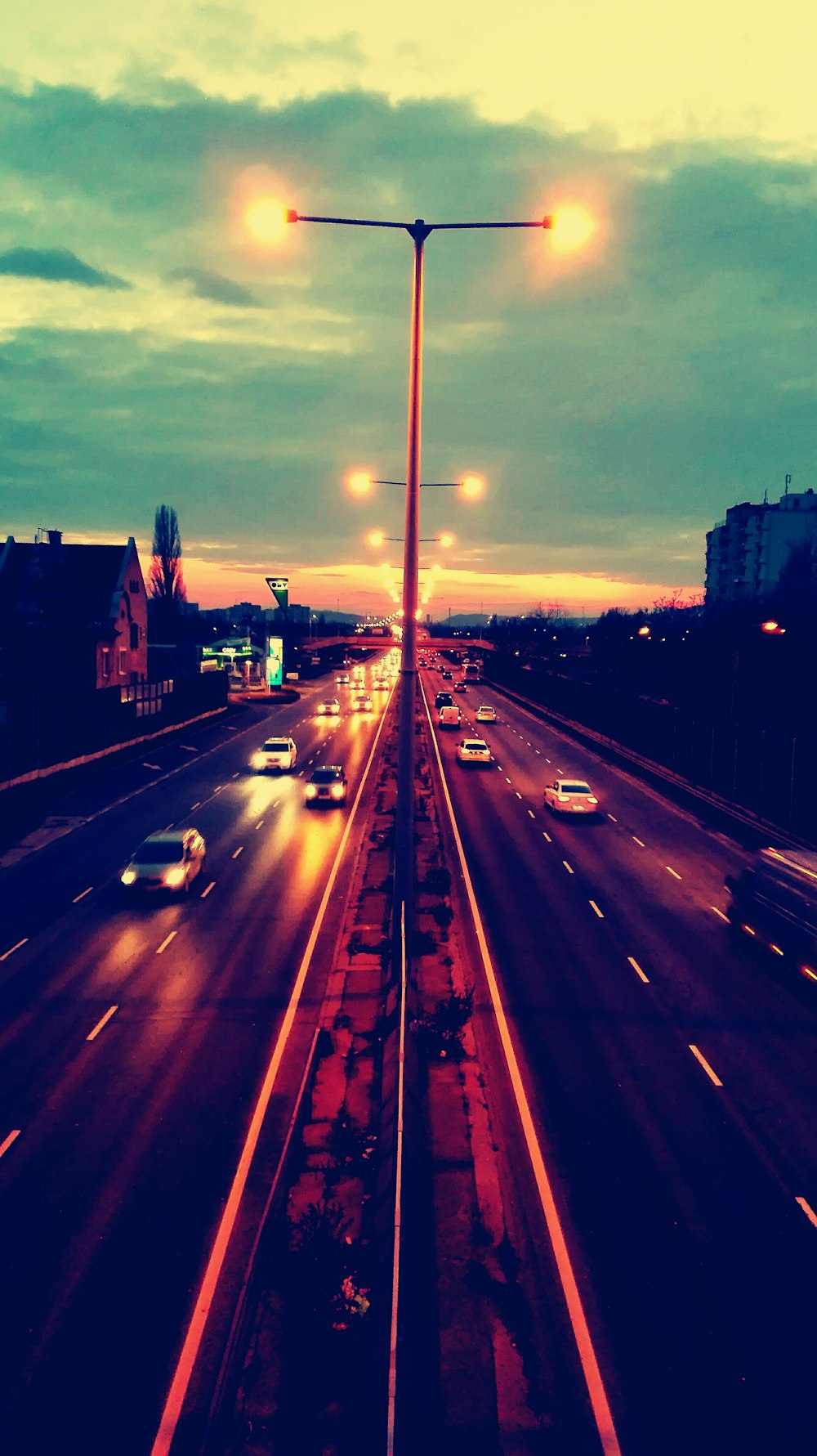 time lapse photography of highway cars