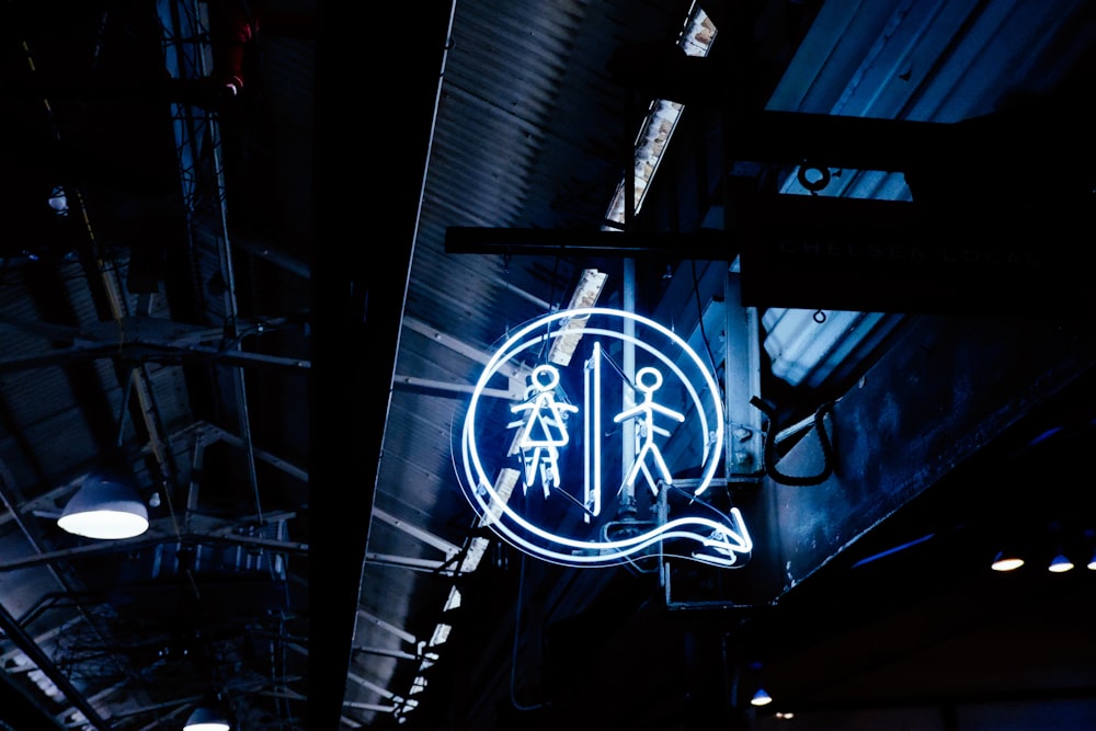 white restroom neon signage