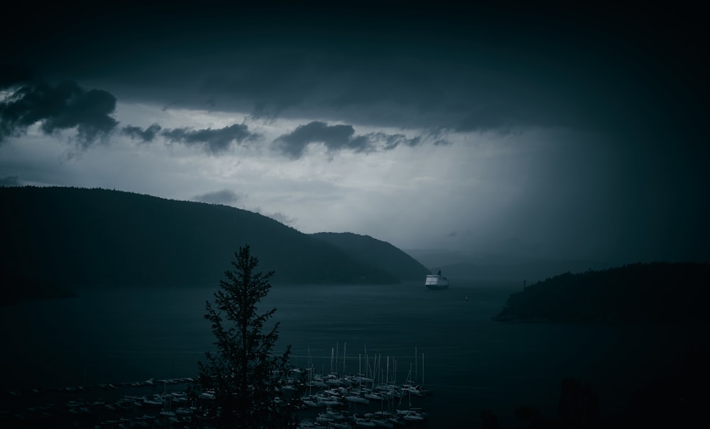 landscape photo of a ship in a lake