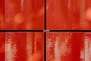 Score tracker tiles carved from medieval stone with glowing red and blue accents and subtle embers.