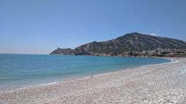 A peaceful beach in Fethiye with crystal clear water.