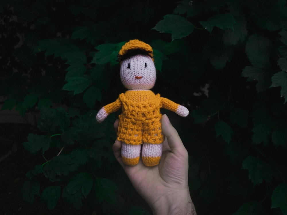 orange and white crochet doll