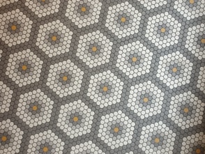white, grey, and brown honeycomb decor