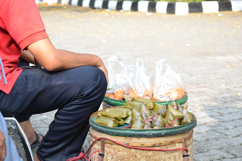 cooked food with banana wrap on brown basket