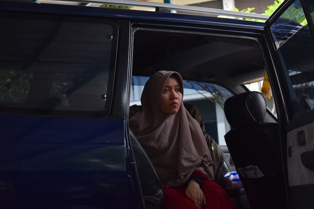 woman riding inside the vehicle