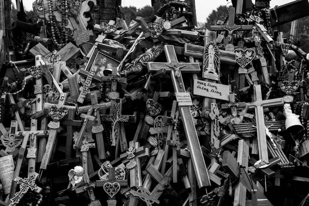 grayscale photo of crucifix lot