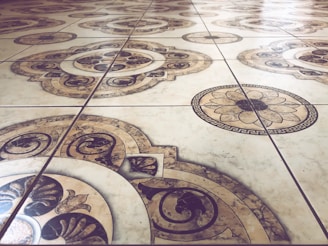 brown and beige floral tiles