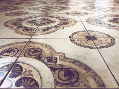brown and beige floral tiles