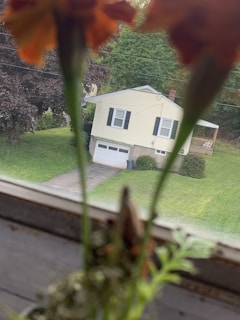 Front view of a charming Orange County single-family home with a manicured lawn.