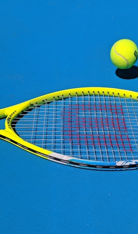 yellow Wilson tennis racket