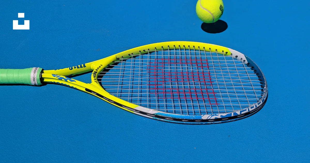 Yellow Wilson tennis racket photo – Free Blue Image on Unsplash