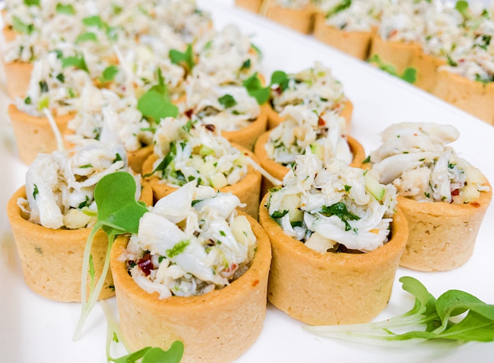 round brown bowls with foods