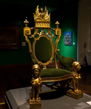 gold and green armchair
