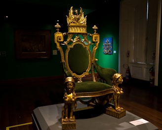 gold and green armchair