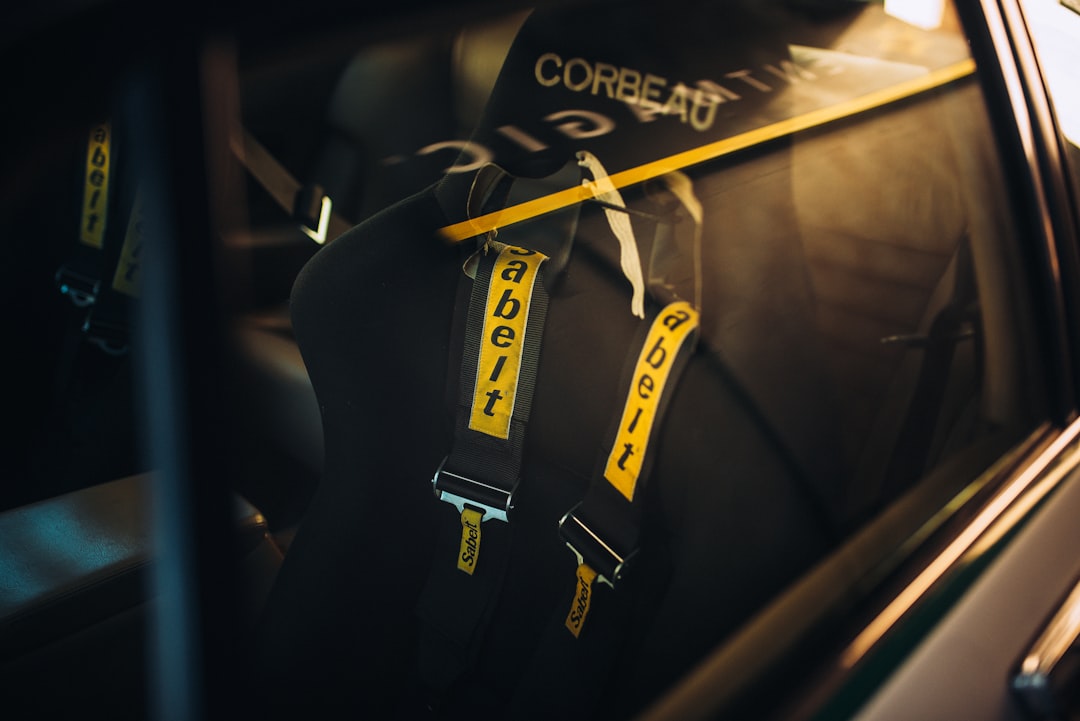 black vehicle bucket seat, Jaguar XJ converted cockpit to race spec.