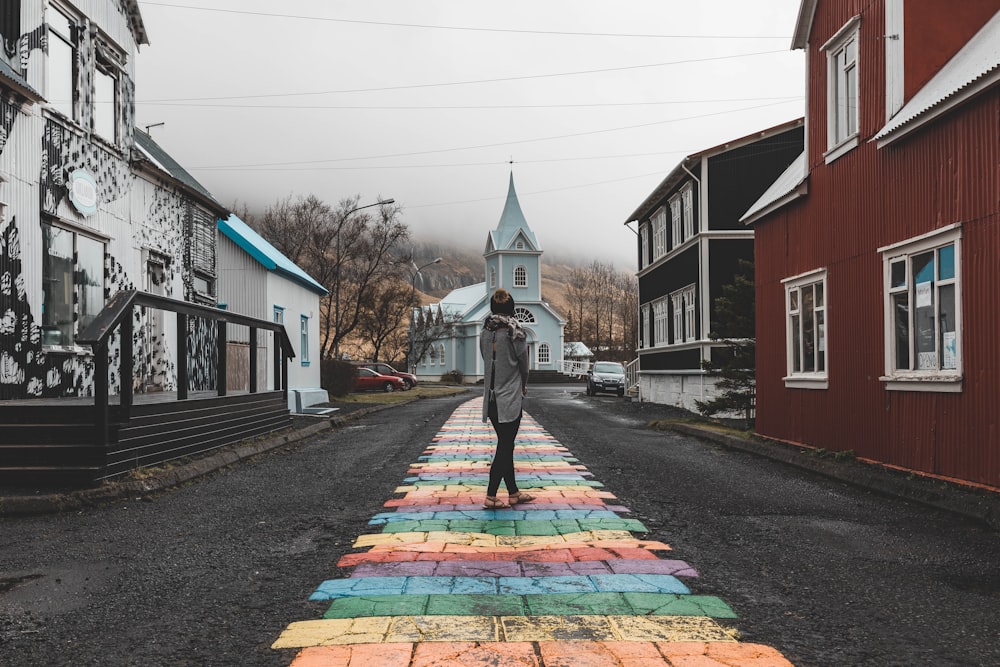 woman standing at middle of road