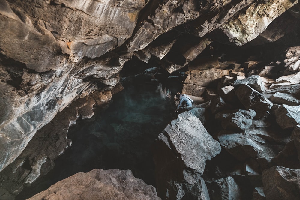 body of water surrounded rocks