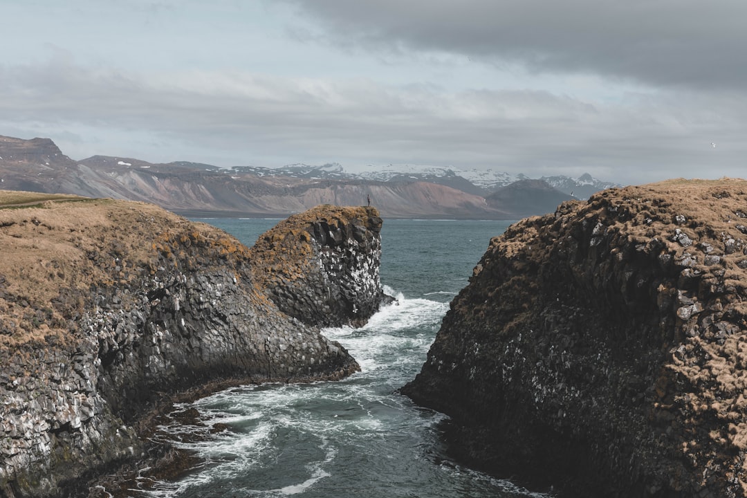 architectural photography of brown rock formation