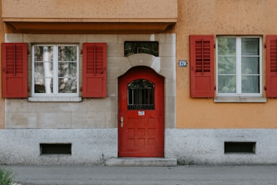 closed red wooden door