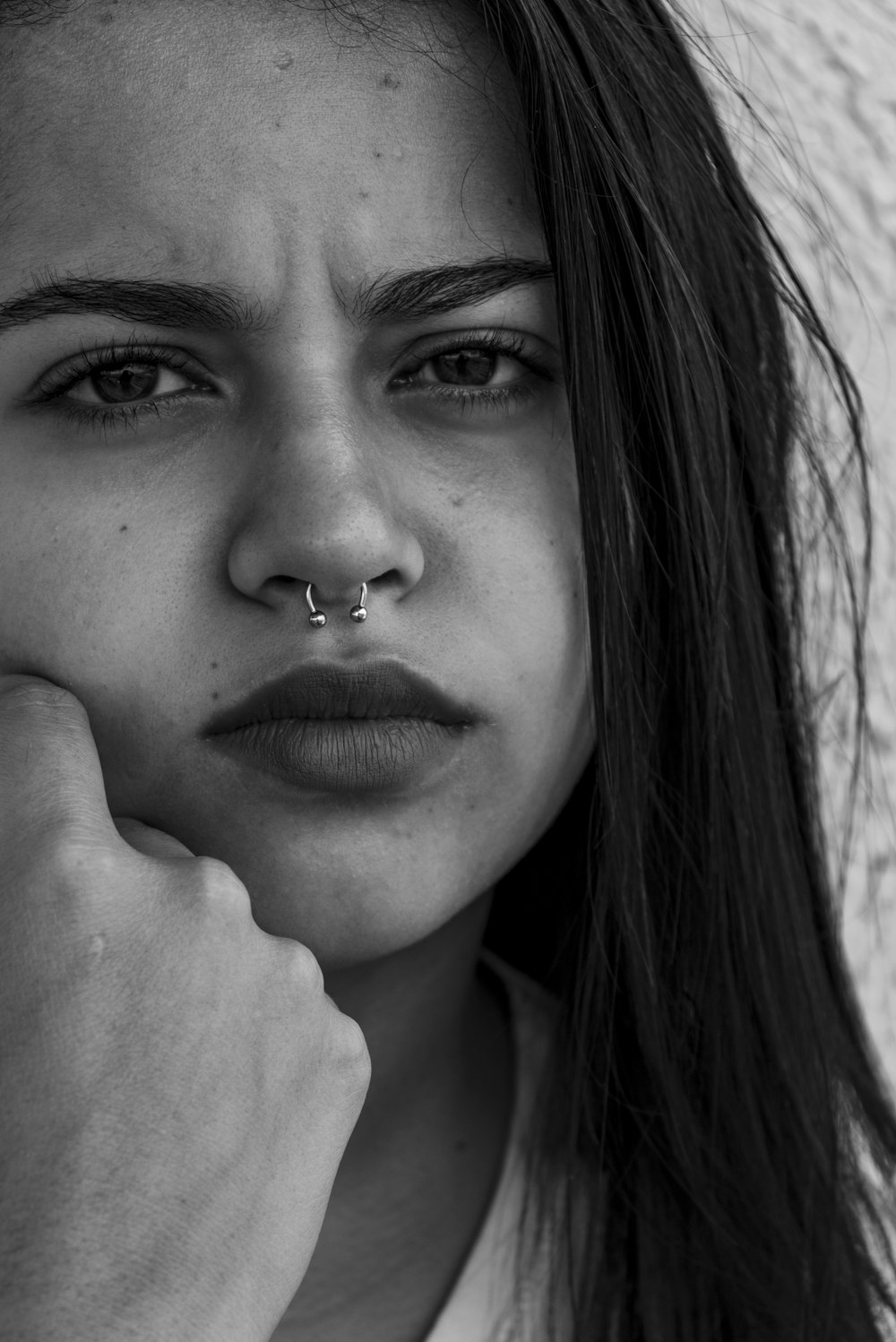 grayscale photography of woman with nose piercing