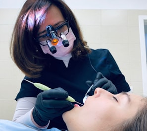 a dentist performing a dental procedure