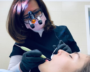 a dentist performing a dental procedure