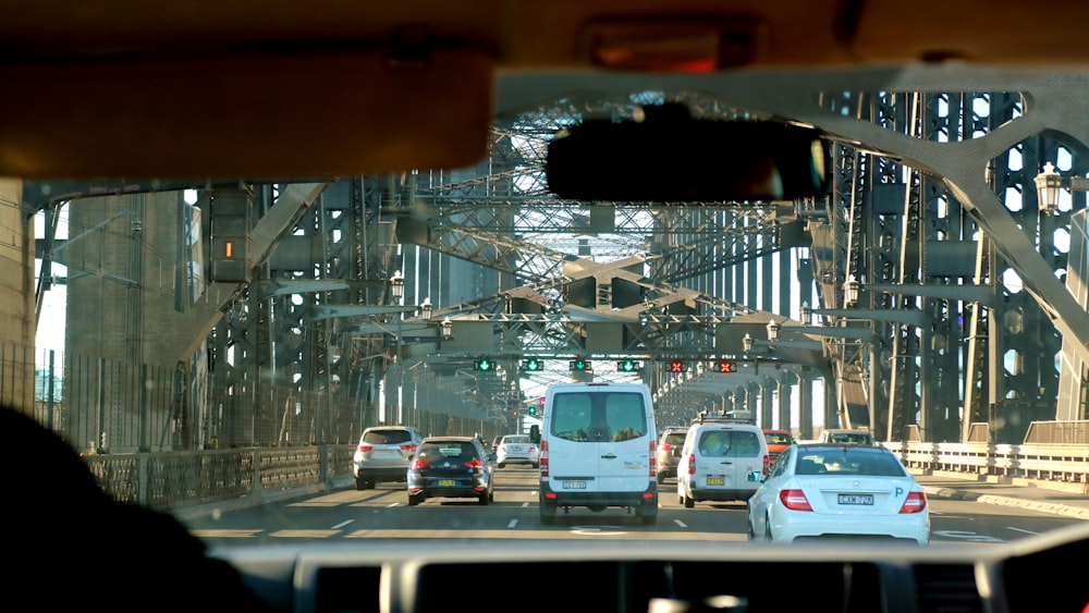 vehicle crossing bridge during daytime