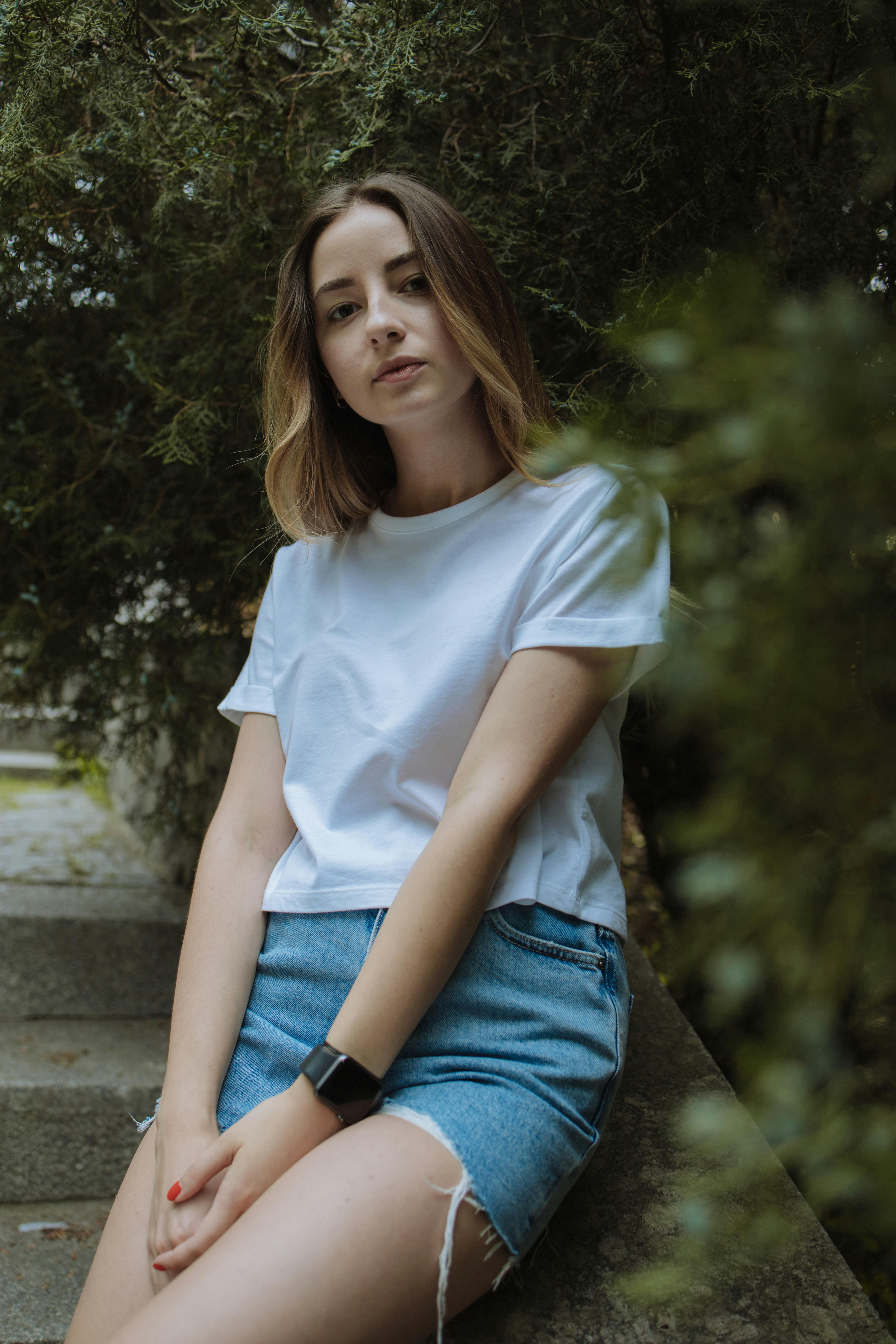 white t shirt and blue jeans female