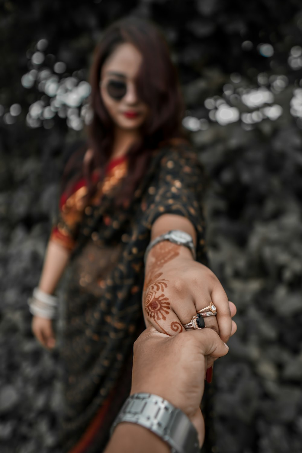 person holding woman's hand
