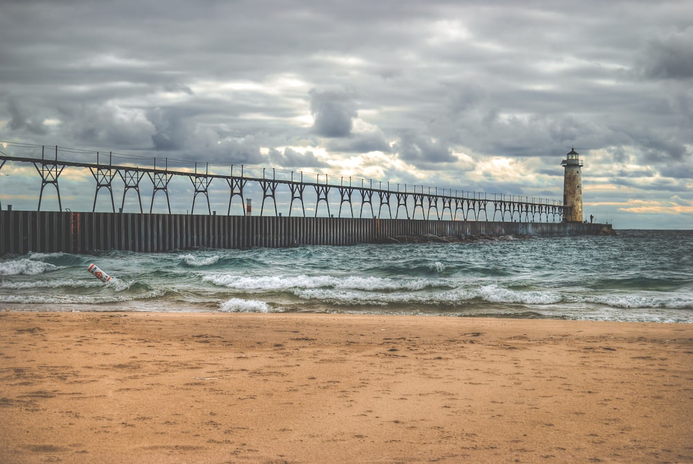 view of white lighthouse during daytime