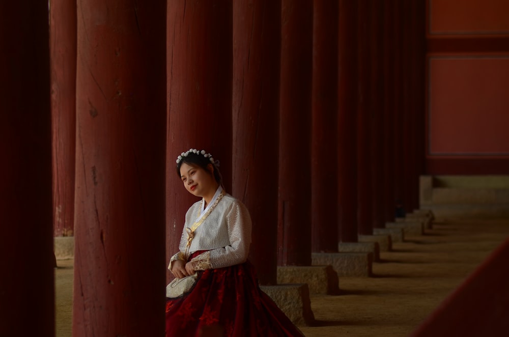 woman wearing red and white hanbok
