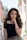 selective focus photography of woman wearing black off-shoulder blouse