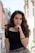 selective focus photography of woman wearing black off-shoulder blouse