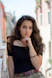 selective focus photography of woman wearing black off-shoulder blouse