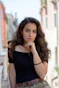 selective focus photography of woman wearing black off-shoulder blouse