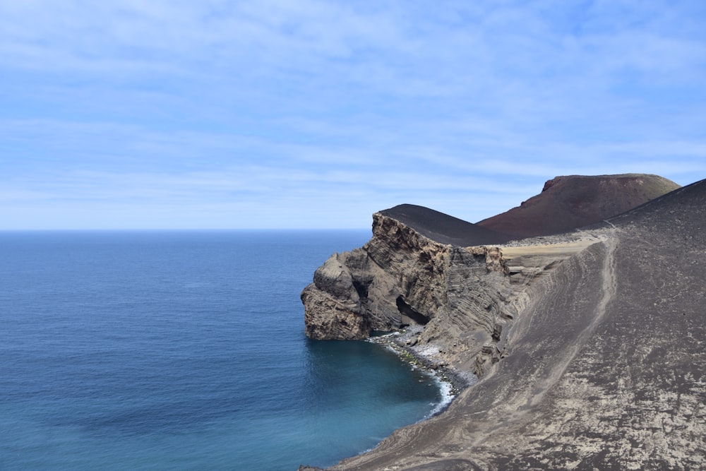 view of hillside sea during daytime