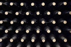 a close up of a bunch of wine bottles