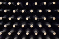 a close up of a bunch of wine bottles