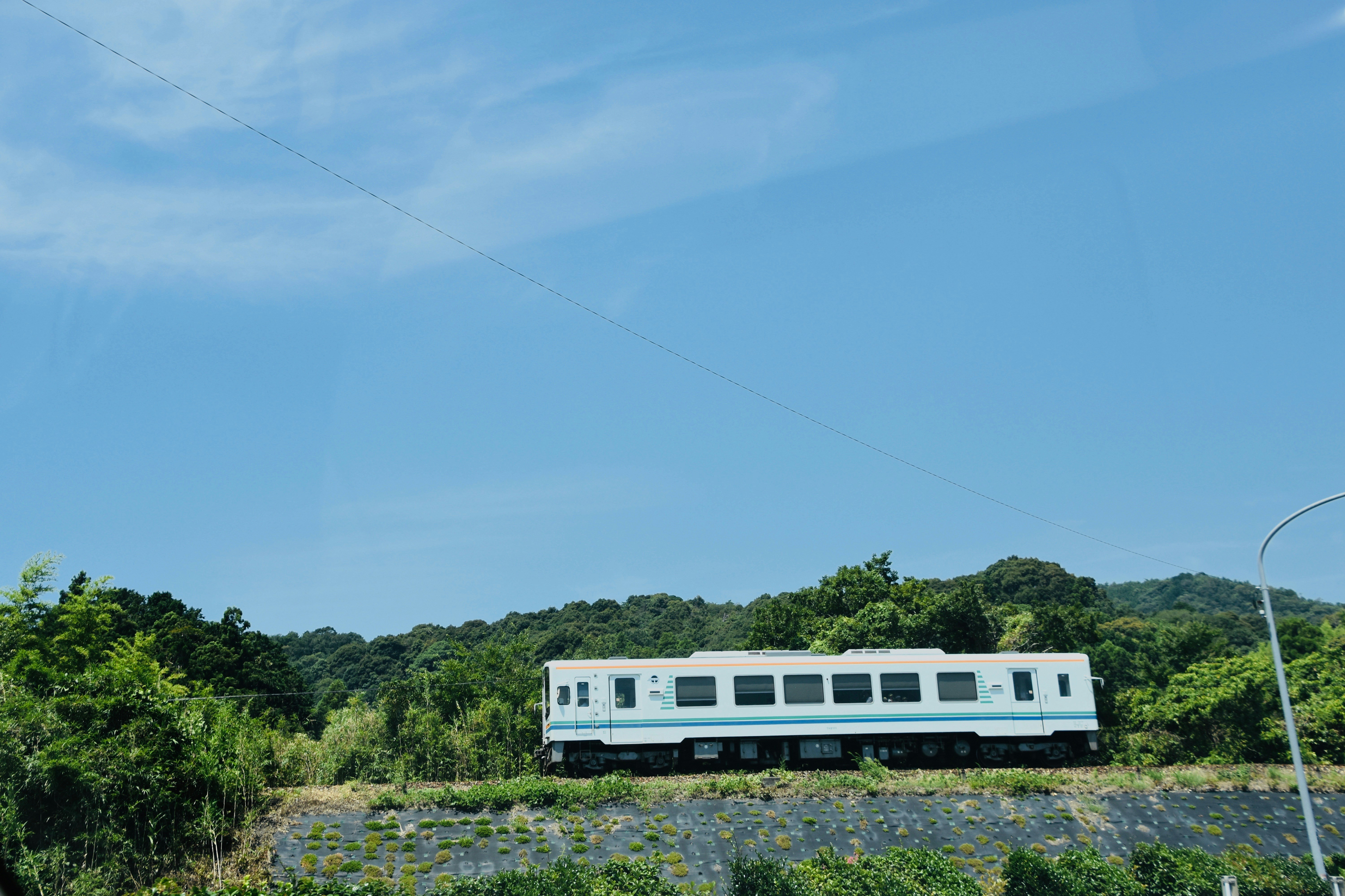 view of white train during daytime